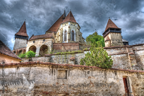 Biertan Fortified Church, located in Transylvania, Romania, dramatic view before a summer storm.