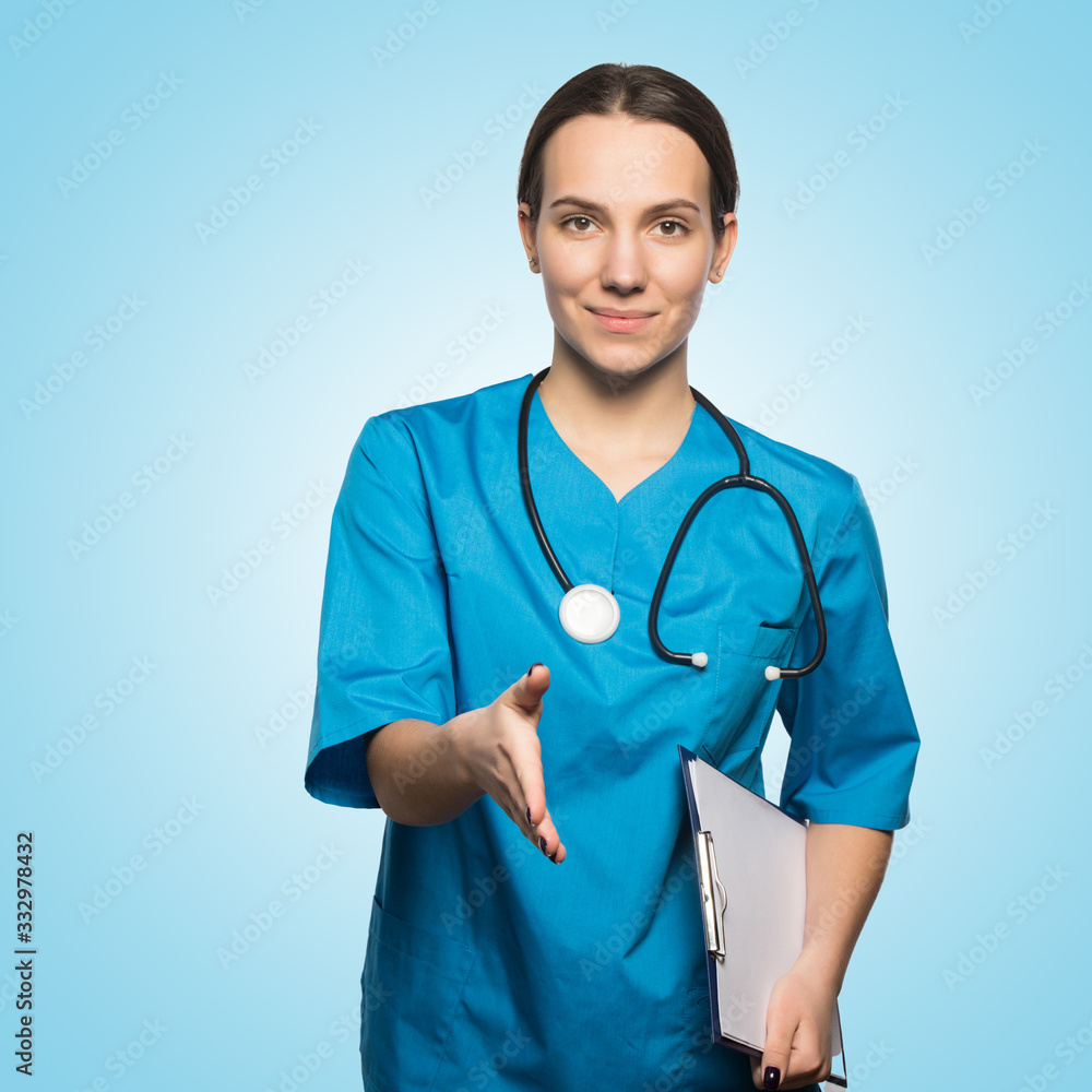 Doctor pretty woman over blue hospital background Doctor pretty woman over blue hospital background