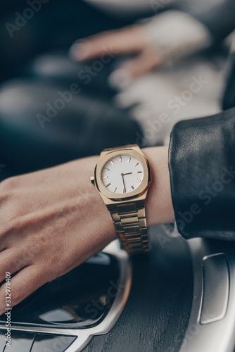 Stylish classic watch on woman hand