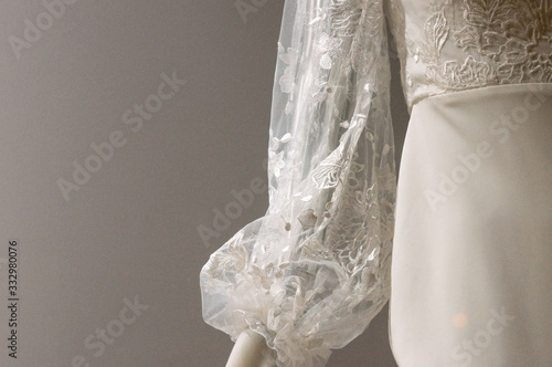 elegant lace sleeved wedding dress close up