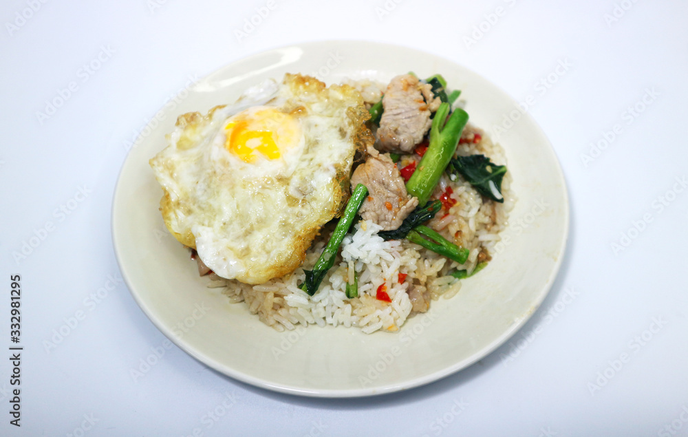 Stir Fried Kale with Rice and Fried Eggs on White Background, Thai Food Stir Fried Kale with Rice and Fried Eggs on White Background, Thai Food