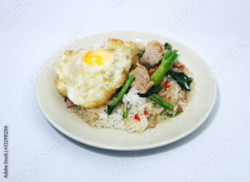 Stir Fried Kale with Rice and Fried Eggs on White Background, Thai Food