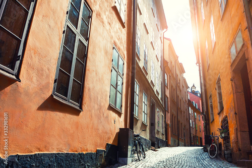 Beautiful street at sunset in Old Town of Stockholm, Sweden. Famous travel destination