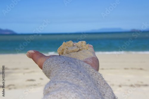 sand in hand