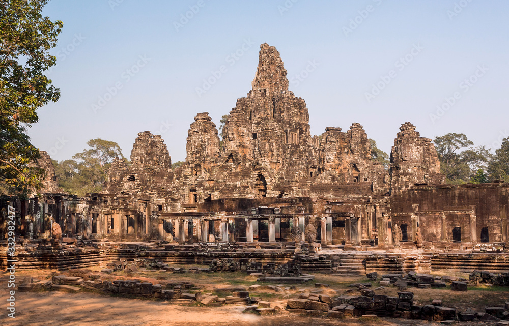 Towers and walls of the 12th century Bayon temple, Cambodia. Historical landmark in Angkor. UNESCO world heritage site