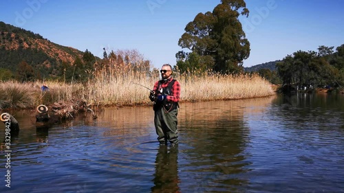 Hisaronu Orhaniye, Marmaris - Mugla / Turkey. March 12, 2020. Fisherman at river in Hisaronu. photo