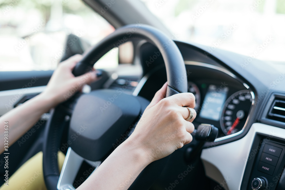 Anonymous Woman Driving a Car Anonymous Woman Driving a Car