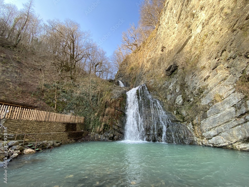 Naklejka premium Waterfall in the mountains