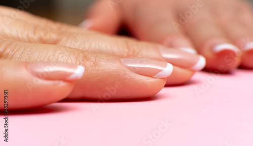 female fingers with a beautiful manicure. front view, close-up