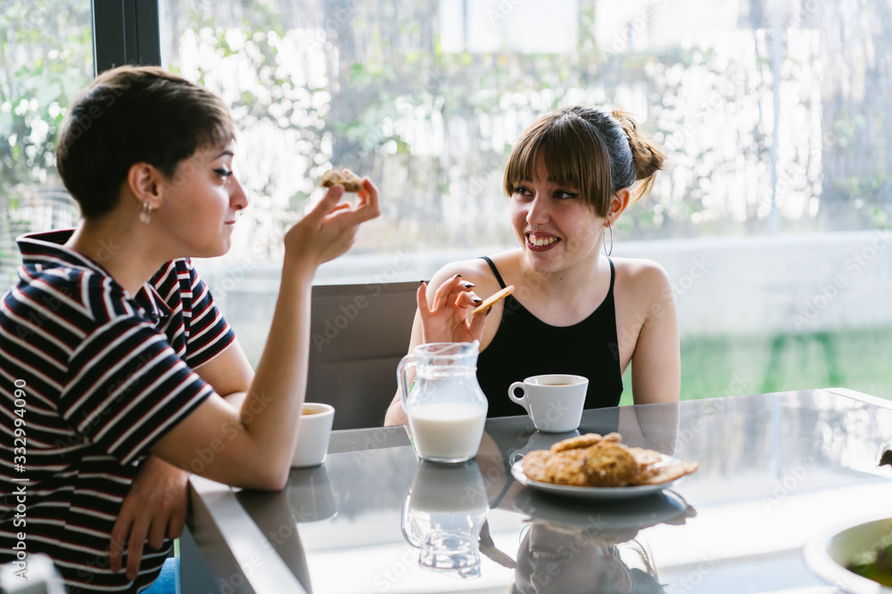 Friends Having Breakfast At Home. Friends Having Breakfast At Home.