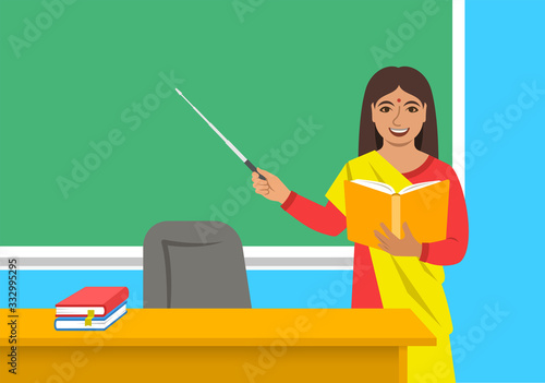 Indian woman teacher in sari standing with open book and pointer at the blackboard in classroom. School class interior. Education concept. Cartoon vector illustration. Back to school banner.