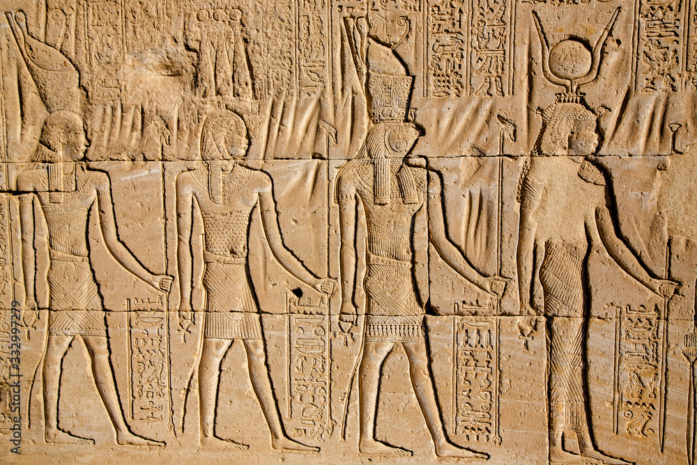 Wall with ancient hieroglyphs of Karnak Temple drawings, Luxor, Egypt Wall with ancient hieroglyphs of Karnak Temple drawings, Luxor, Egypt