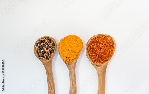 Colourful various herbs and spices for cooking on background