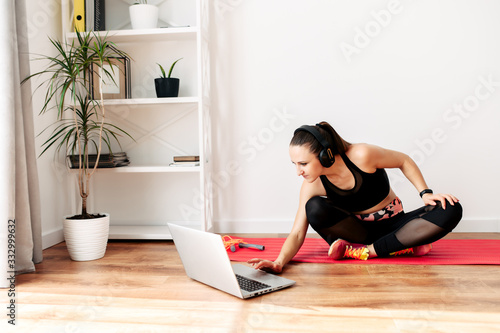 Fitness at home. Slender woman is training