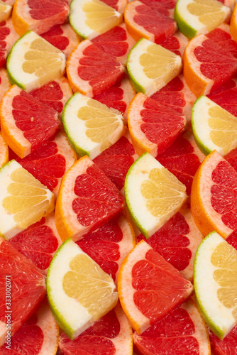 Pomelo and grapefruit slices background.