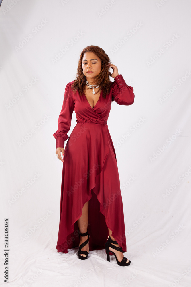 Thoughtful Hispanic woman with her hand in her hair Thoughtful Hispanic woman with her hand in her hair