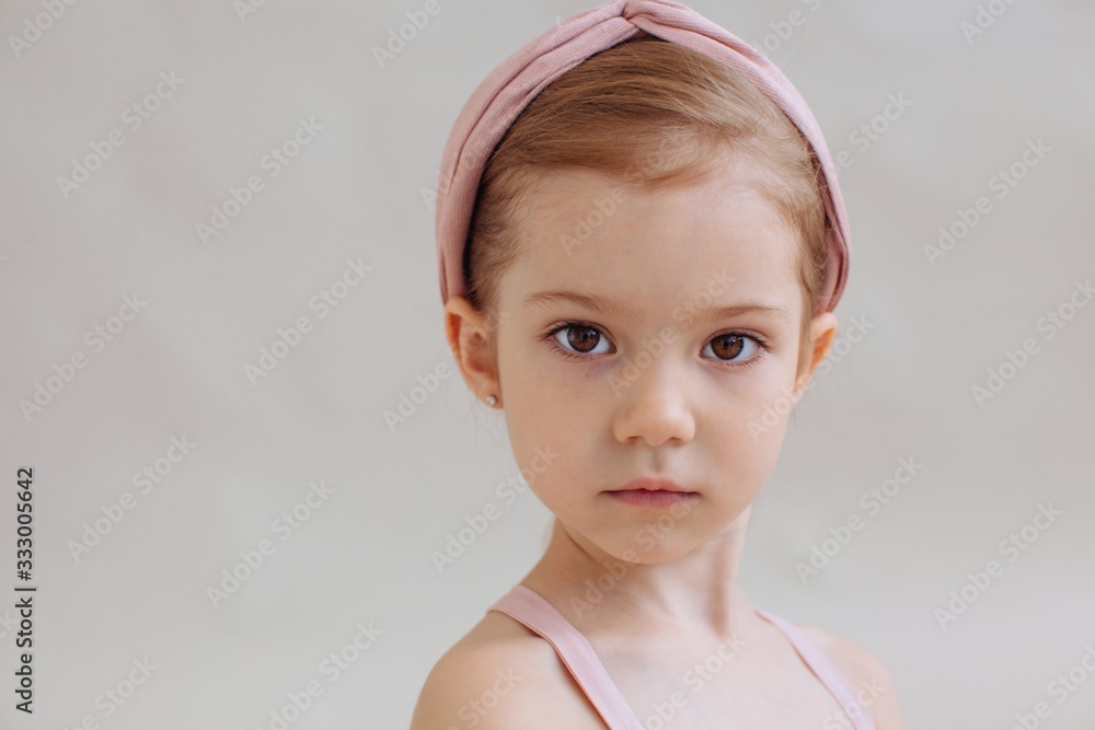 Closeup portrait of little serious girl Closeup portrait of little serious girl