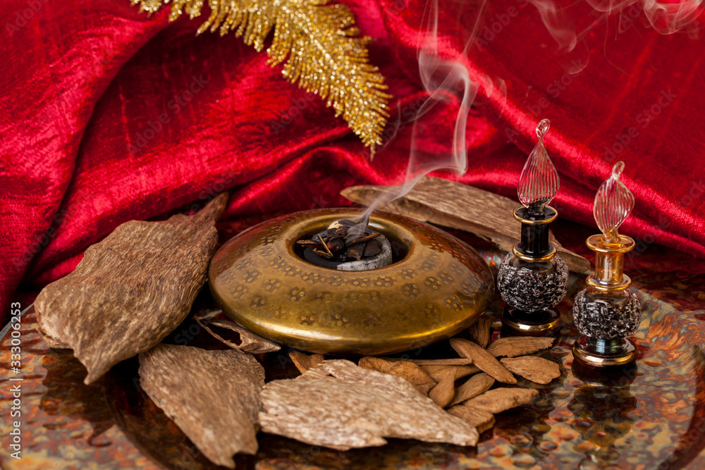 Agarwood, also called aloeswood, essential oil and incense chips Agarwood, also called aloeswood, essential oil and incense chips