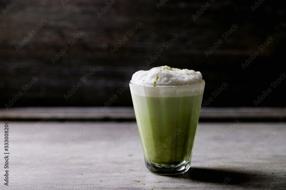 Home made vegan matcha tea latte with coconut milk Home made vegan matcha tea latte with coconut milk