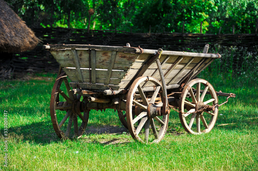 Rural cart in the Ukrainian estate. Ukraine. Ukrainian traditions. Carpathians.