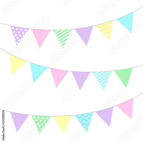 flags in pastel colors. Decoration for the holiday. Triangular flags with polka dots, stripes and waves.