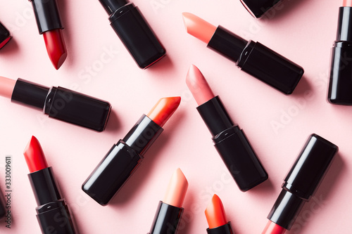 Chaotic layout of shiny lipsticks photo