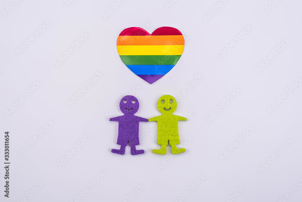 LGBT figures of people. Two figures of men show unconventional orientation. Marriage and family, couple. White background. LGBT figures of people. Two figures of men show unconventional orientation. Marriage and family, couple. White background.