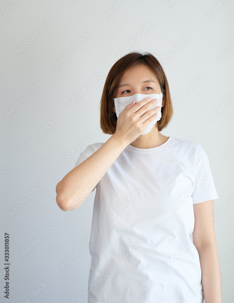 woman wearing mask get sick from corona virus, covid19, flu symptom as sneezing, cough, fever, body ache, breathing , pain. woman wearing mask get sick from corona virus, covid19, flu symptom as sneezing, cough, fever, body ache, breathing , pain.