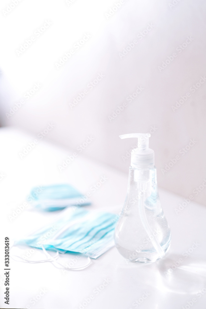 Coronavirus prevention medical sterile masks and hand sanitizer gel for hand hygiene coronavirus protection. The concept of preventing the spread of the epidemic and treating pandemic in quarantine Coronavirus prevention medical sterile masks and hand sanitizer gel for hand hygiene coronavirus protection. The concept of preventing the spread of the epidemic and treating pandemic in quarantine