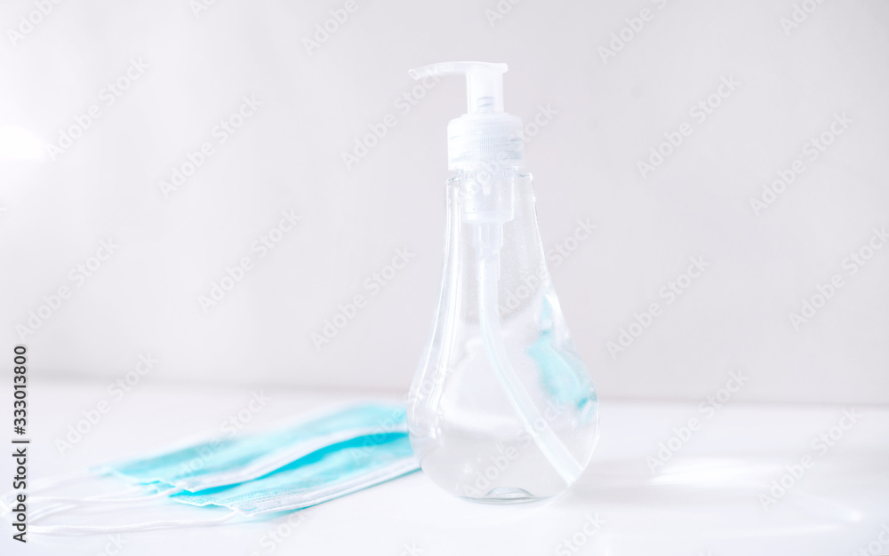Coronavirus prevention medical sterile masks and hand sanitizer gel for hand hygiene coronavirus protection. The concept of preventing the spread of the epidemic and treating pandemic in quarantine Coronavirus prevention medical sterile masks and hand sanitizer gel for hand hygiene coronavirus protection. The concept of preventing the spread of the epidemic and treating pandemic in quarantine