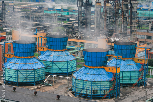 View of old chemical plant and oil refinery emitting smoke