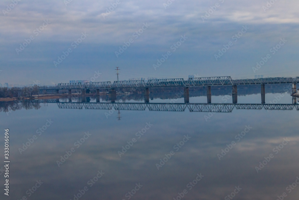 View of Petrivskiy railroad bridge across the Dnieper river in Kiev, Ukraine