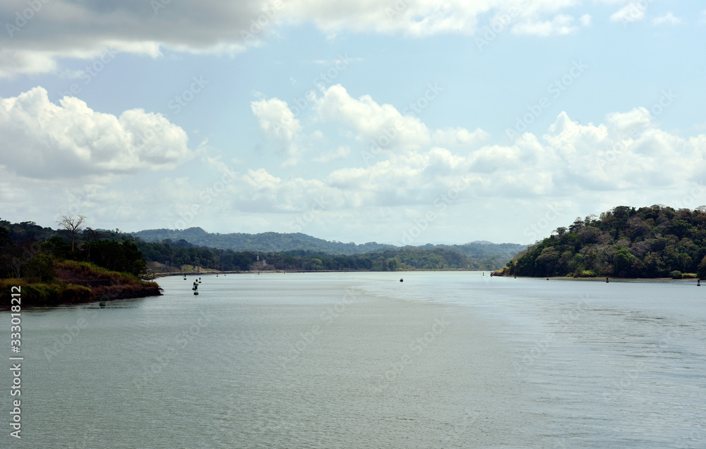 Landscape of Panama Canal, view from the transiting cargo ship.