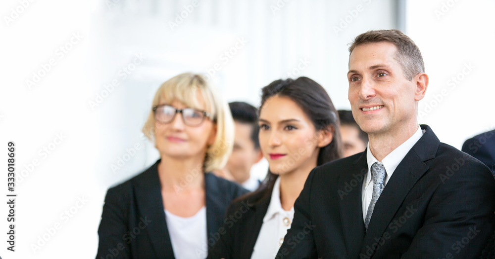 Young diverse business team posing with crossed arms