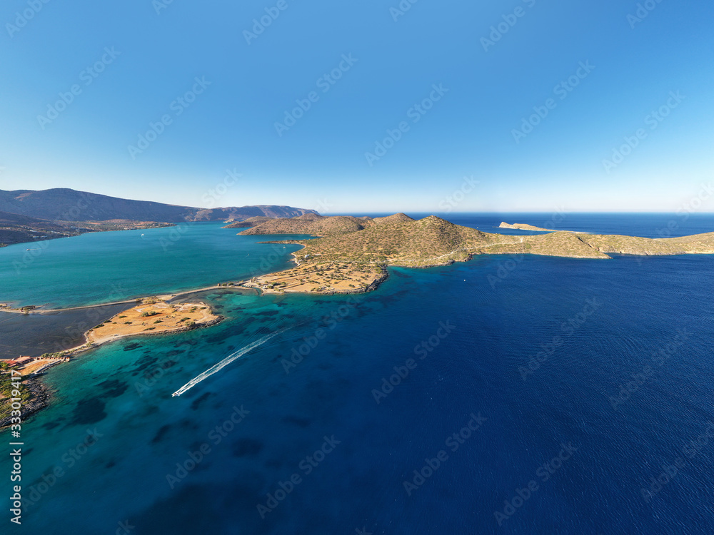 Aerial view of a pleasure boat with tourists. Elounda, Crete, Greece Aerial view of a pleasure boat with tourists. Elounda, Crete, Greece
