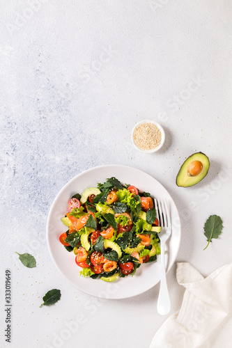 Salmon Salad with Vitamins in vegetables, herbs and avocado © lily_rocha