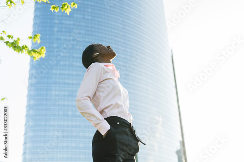 Young businesswoman relaxing in the city