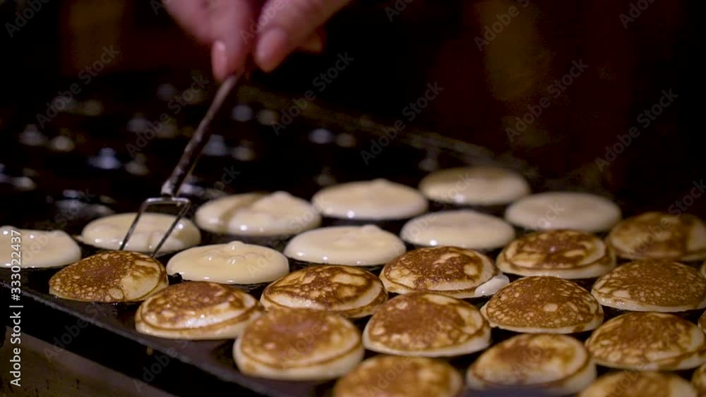 custom made wallpaper toronto digitalBaking little pancakes on New Year's Square in Tallinn