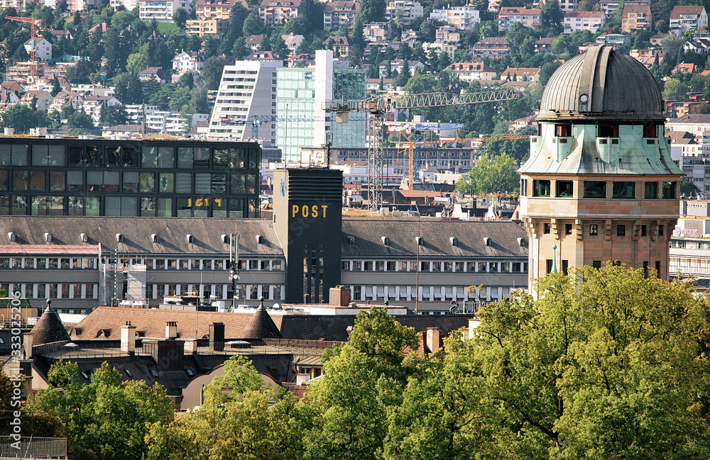 Telescope dome and rooftops Zurich Europe