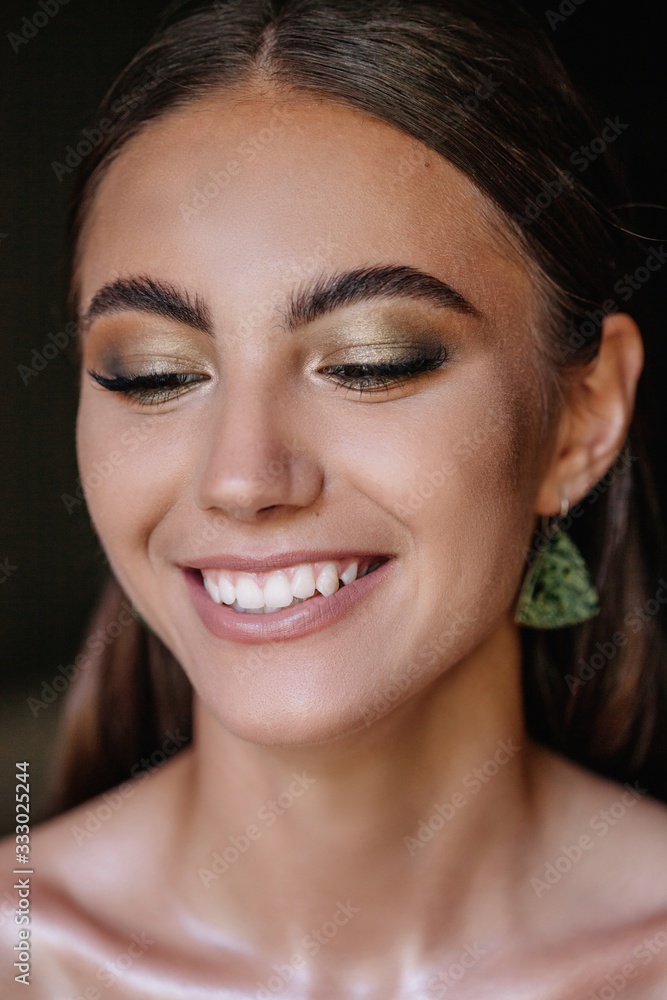 Pretty woman smiling with closed eyes Pretty woman smiling with closed eyes