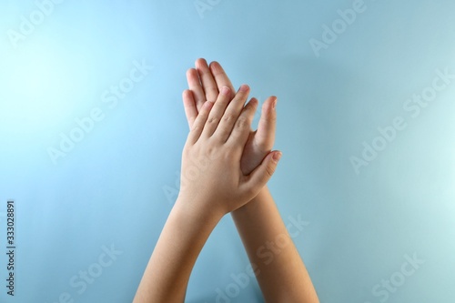 Phase 1 of hand processing in antiseptic. The area of the inner side of the palms. Left hand on top.