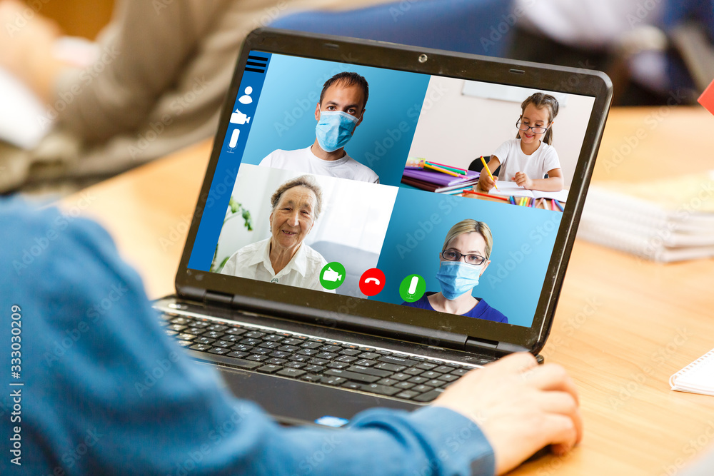 Cropped image of cheerful blogger having funny conversation with best friend in video chat on modern touchpad connecting to wireless 4G internet.Young man sharing impressions of trip on webcam Cropped image of cheerful blogger having funny conversation with best friend in video chat on modern touchpad connecting to wireless 4G internet.Young man sharing impressions of trip on webcam