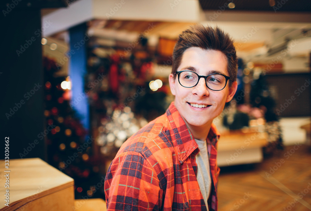 man looks into the distance bright hotel or shop interior man looks into the distance bright hotel or shop interior