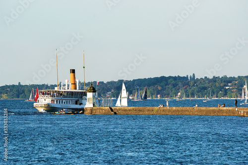 Steamboat Geneva Lake at the pier in summer in Switzerland