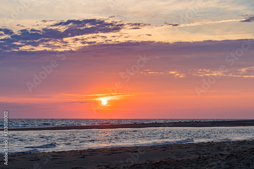 Sunset on the beach on north side of the Provincelands Cape Cod, Atlantic ocean view MA US. © Vadim