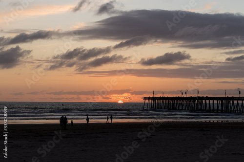 Wonderful view of the sunset and the pier in the city of Pismo Beach, California, USA. Golden hour. © Gabriel Ramos