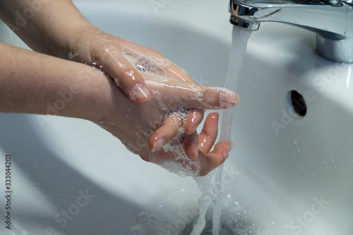 Woman's Hands Cleaned In Sink