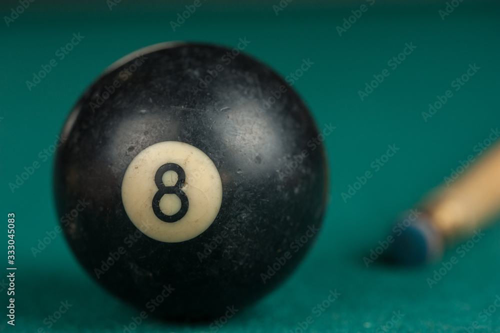 Billiards balls and cue on billiards table. Billiard sport concept. Billiards balls and cue on billiards table. Billiard sport concept.