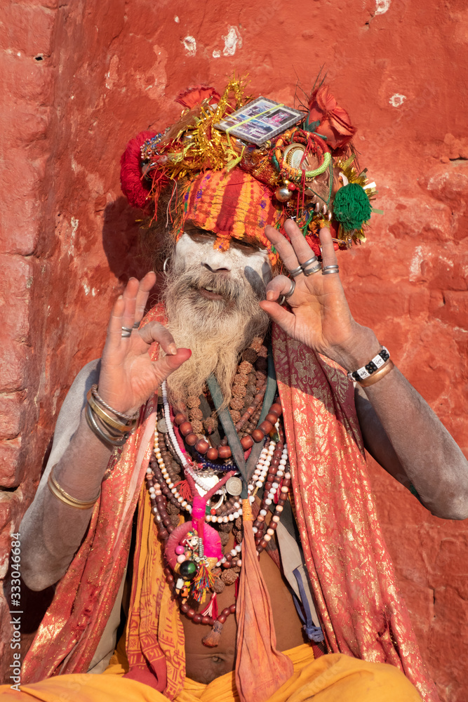 Kathmandu Sadhu men holy person in hinduism with traditional painted face at Pashupatinath Temple of Kathmandu