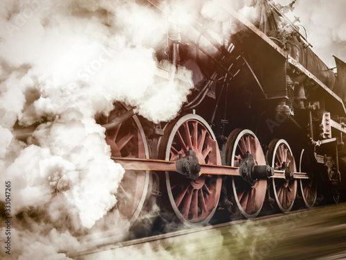 фотографія vintage trains with a steam on the move